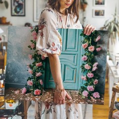 Weathered Turquoise Door Stands Prominently Against A Backdrop Of A Wall Art