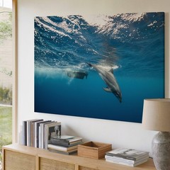 Playful Dolphin Gracefully Swims Underwater, Captured In A Dynamic Wall Art