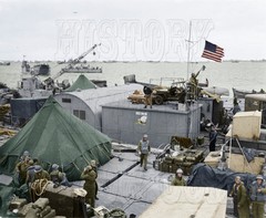US Navy SeeBees Normandy Repair Shop Flag Pontoon WWII color photo – 80-G-47381