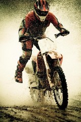 Laminated Dirt Bike 18″L x 12″W, Rider Splashing Water | 1987