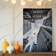 Dramatic Low-angle View Of Towering Skyscrapers Converging Towards A Wall Art