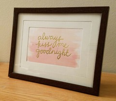 «Always Kiss Me Goodnight» gold foil print, double matted in wood-look frame
