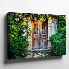 Beautifully Weathered Wooden Door Framed By Intricate Stone Archways Wall Art