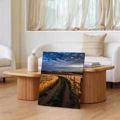 Serene Landscape Depicting Golden Wheat Fields Under A Dramatic Sky Wall Art