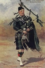 ART.COM Stretched Canvas Print Scottish Bagpiper in Full Uniform, 16″ x 24″