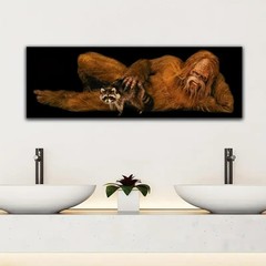 Bigfoot with Raccoon – Unframed Canvas Print – 60″ x 20″ – Sasquatch at his Best