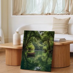 Serene River Landscape Canvas Art With Wooden Boat And Lush Green Trees Print