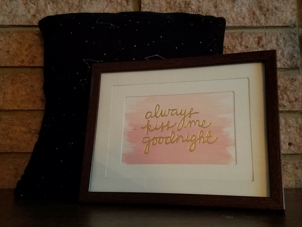 «Always Kiss Me Goodnight» gold foil print, double matted in wood-look frame